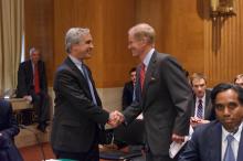 Dr. Hodin is greeted by the Chairman at a committee roundtable discussion.